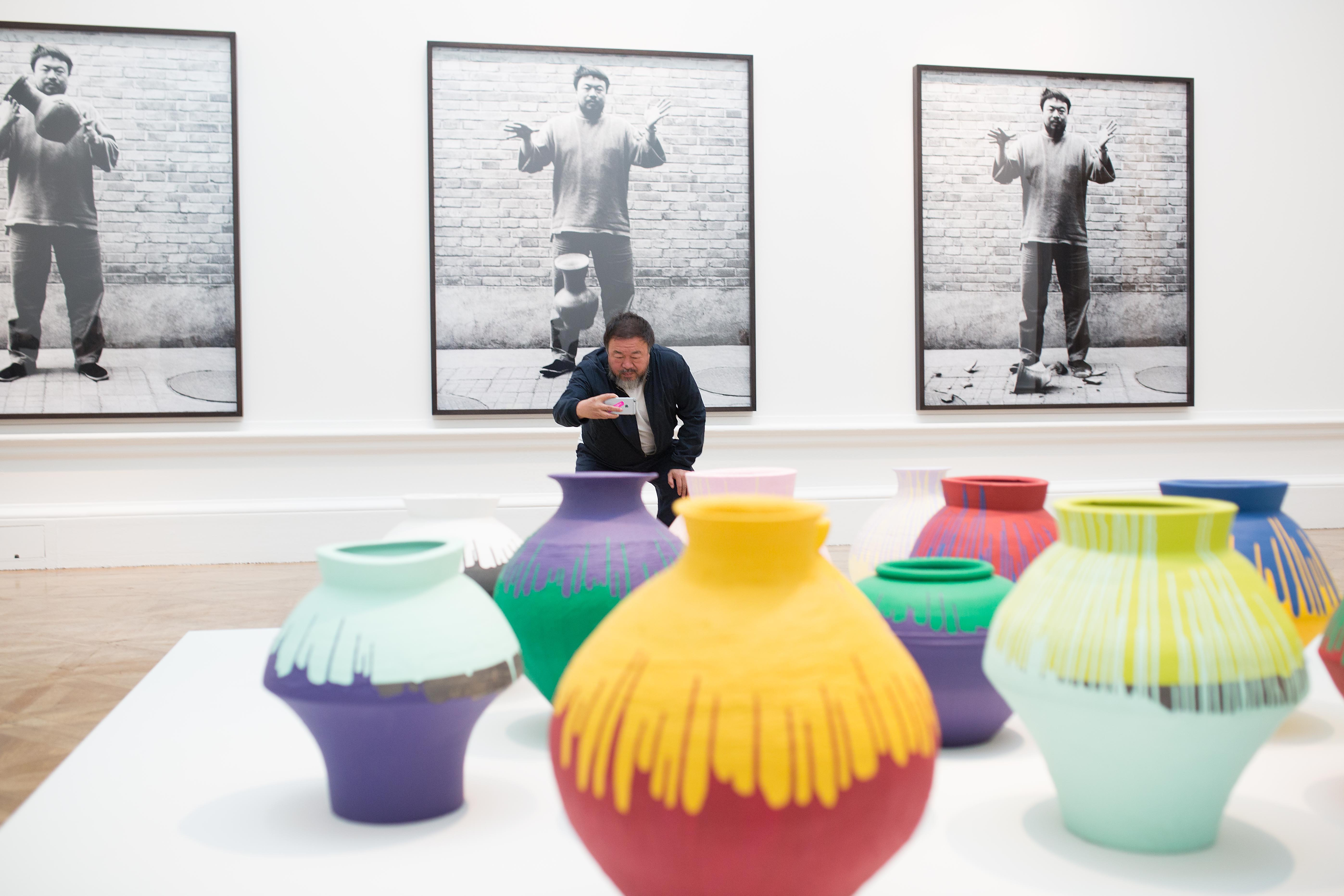 21 Awesome Ai Weiwei Vase 2024 free download ai weiwei vase of ai weiwei at the royal academy of arts damna magazine with ai weiwei taking a photograph of his installation coloured vases royal academy of arts 2015 photo courtesy of roy