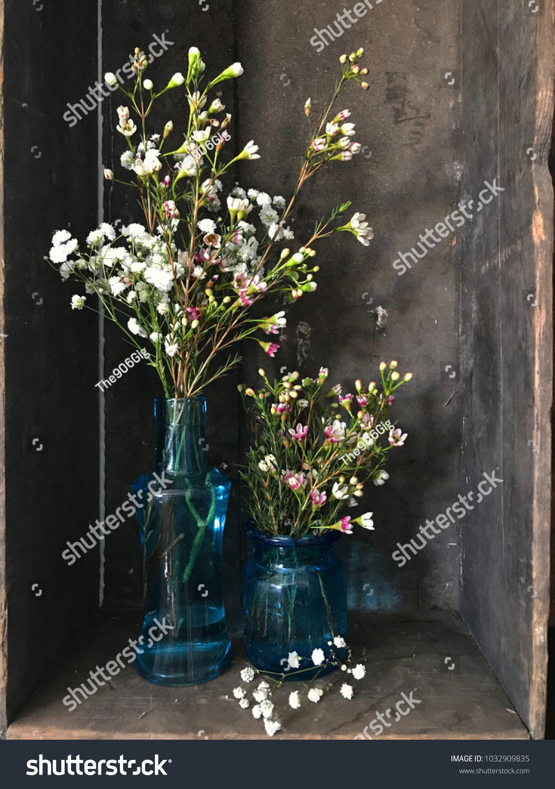 17 Stunning Beautiful Colored Glass Vases 2024 free download beautiful colored glass vases of wildflowers babys breath blue glass vases stock photo edit now for wildflowers and babys breath in blue glass vases wood background rustic country scene