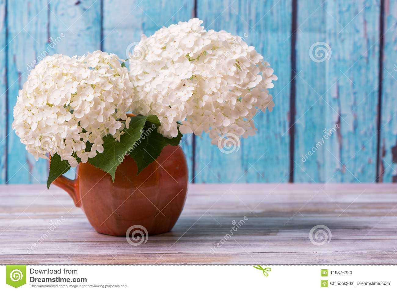 11 Amazing Blue and White Porcelain Flower Vase 2024 free download blue and white porcelain flower vase of white hydrangea flowers in a rustic vase with blue background stock throughout white hydrangea flowers in a rustic vase with blue background