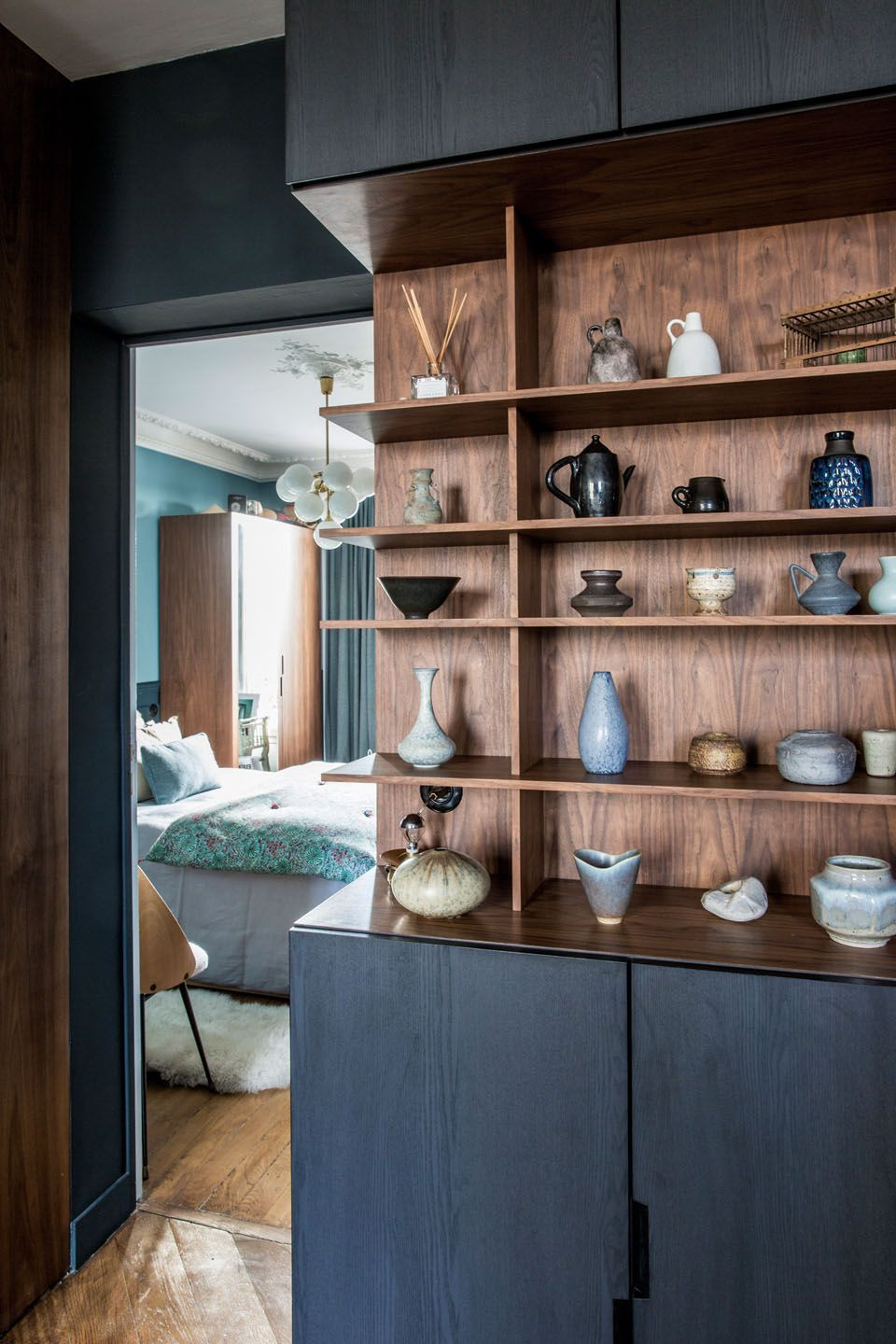 18 Elegant Dark Wood Vase 2024 free download dark wood vase of tour a single dads moody and masculine french apartment dacor throughout styled wood shelves with vases urns and dishes black cabinetry and a peek into the bedroom