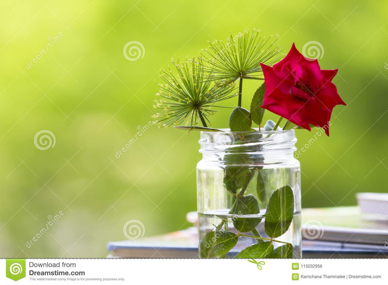 21 Great Red and Yellow Glass Vase 2024 free download red and yellow glass vase of flowers in glass bottle on green background stock photo image of throughout the grass flowers and red rose in glass bottle is placed near the pile of books on bl