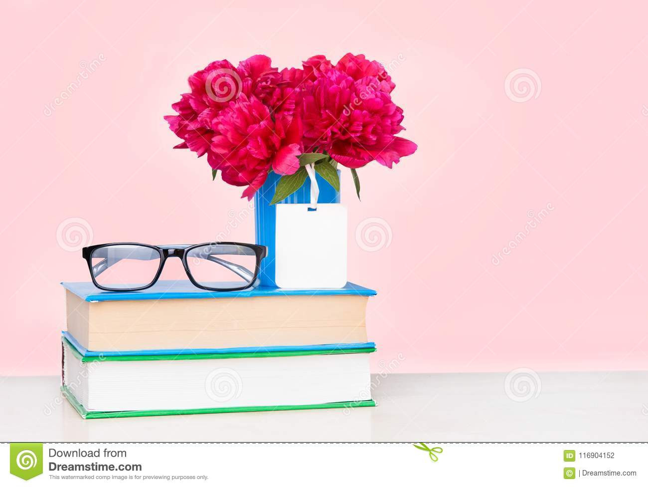 11 Best Stacked Teacup Vase 2024 free download stacked teacup vase of a pile of books and a vase of flowers on a wooden table stock photo regarding a pile of books and a vase of flowers on a wooden table